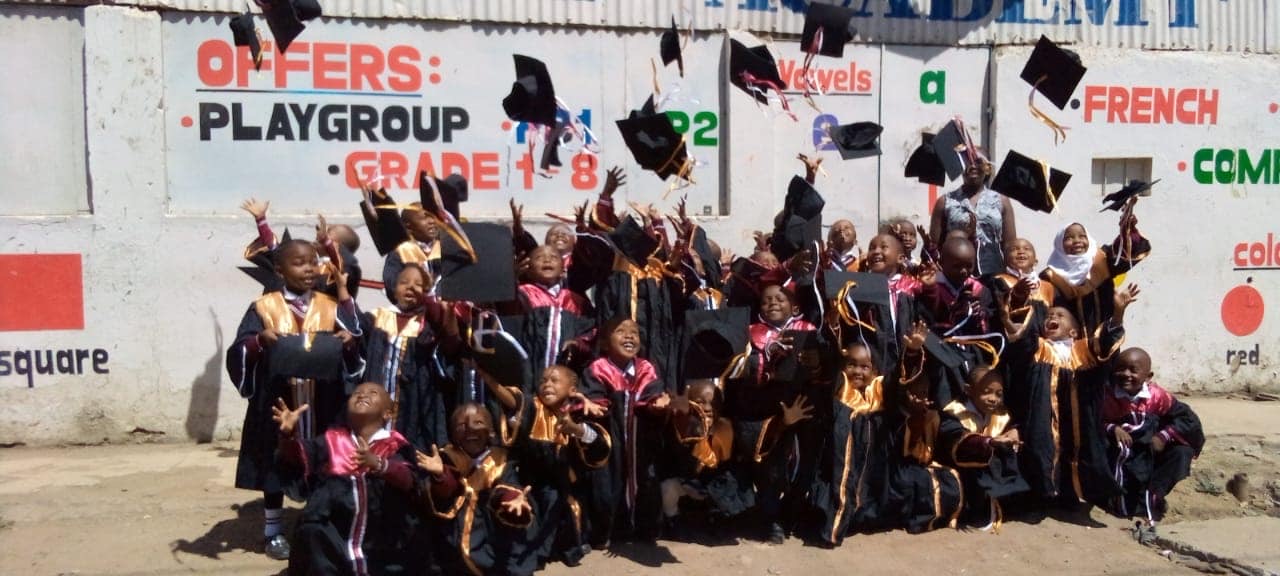 Graduates throwing caps